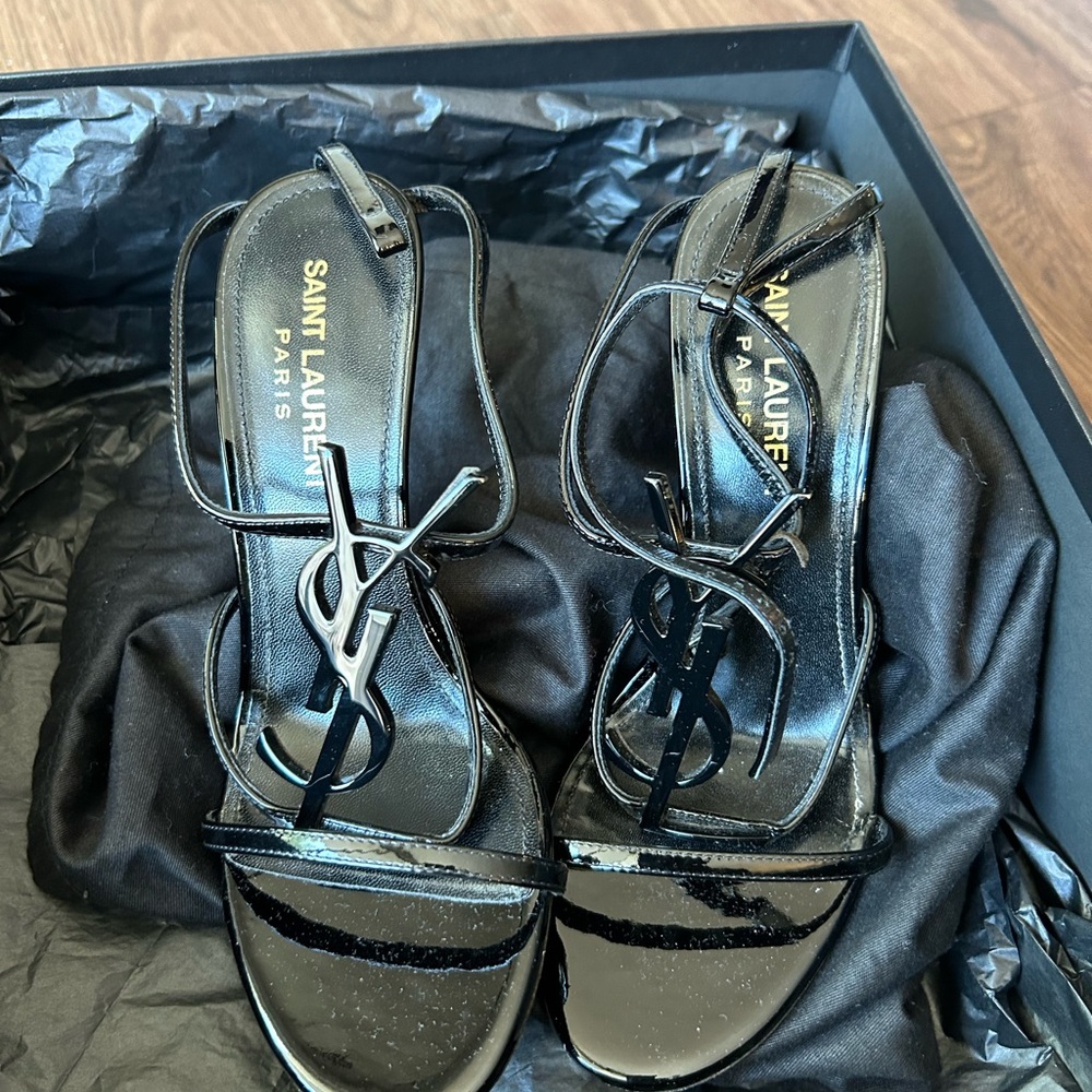 Saint Laurent Cassandra logo embellished patent leather sandal